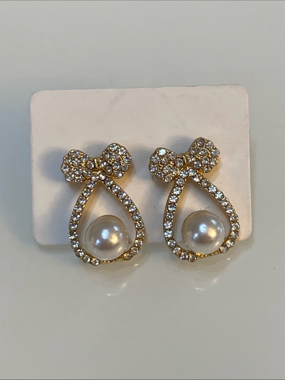 Pierced bow earrings